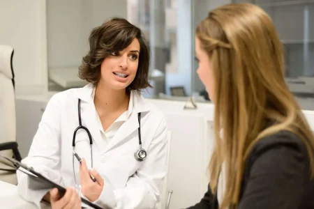 Doctor talking to a patient