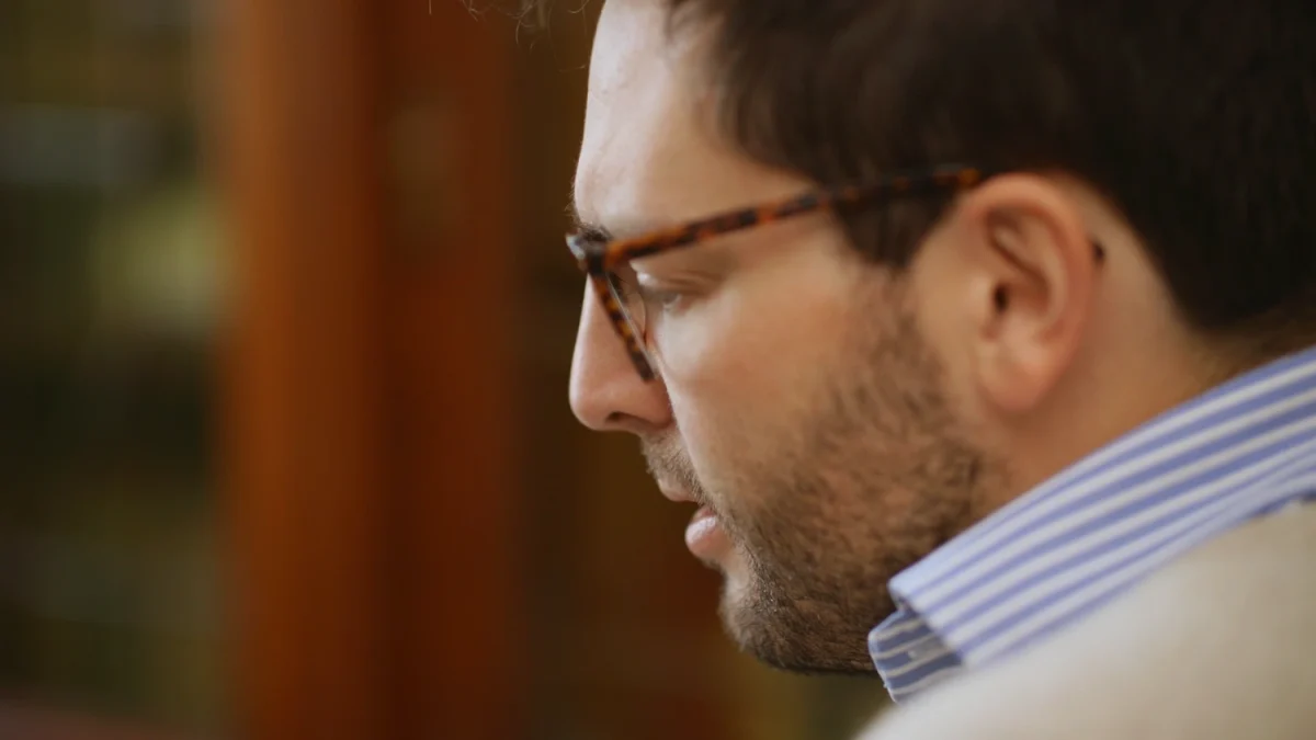 Side profile close up photo of a man