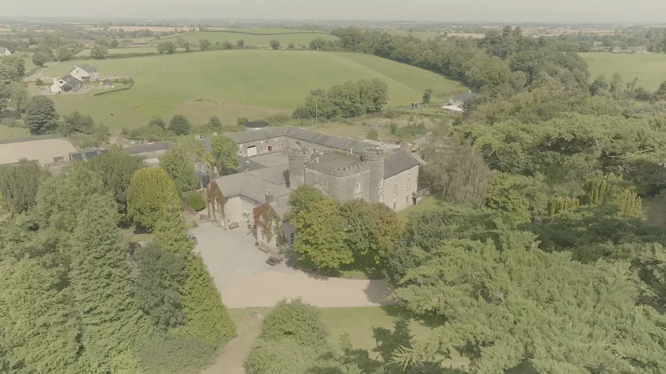 Aerial photo of Smarmore Castle surrounded by trees and fields