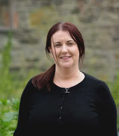 Portrait photo of Sarah Mackin, Administration Assistant at Smarmore Castle, photo taken outside.